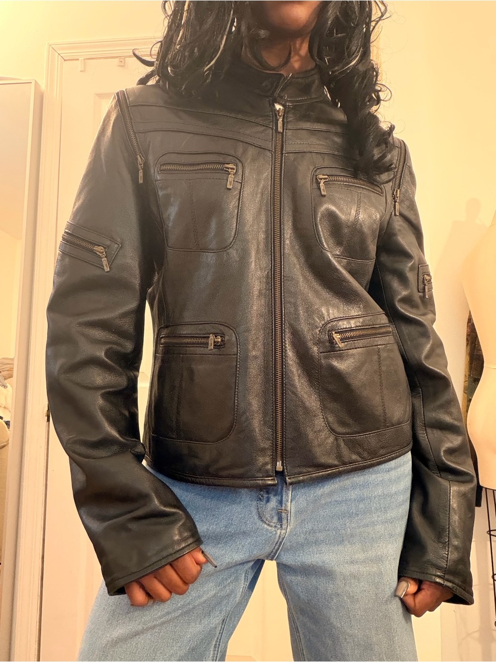 Black leather motto jacket with multiple pockets